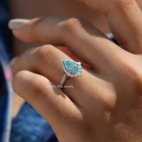 Pear Cut Moissanite Engagement Ring In Finger