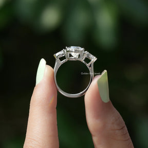 Back View of Pear Cut Diamond Engagement Ring In two fingers