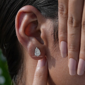 Colorless pear-cut Stud Earrings In 14K White Gold