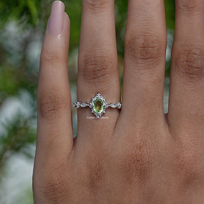 Detailed View Of Oval Cut Accent Stone Engagement Ring