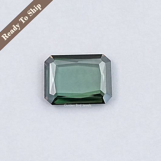 Emerald-cut green moissanite loose gemstone with faceted octagon shape