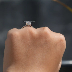 Back View of Moissanite Portrait Cut Engagement Ring In two fingers