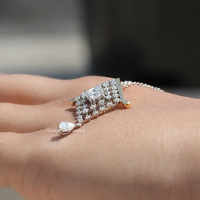 Side view of Portuguese cut moissanite statement pendant