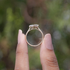 Back view of Radiant And Heart Cut Moissanite Two Stone Ring in secure setting 
