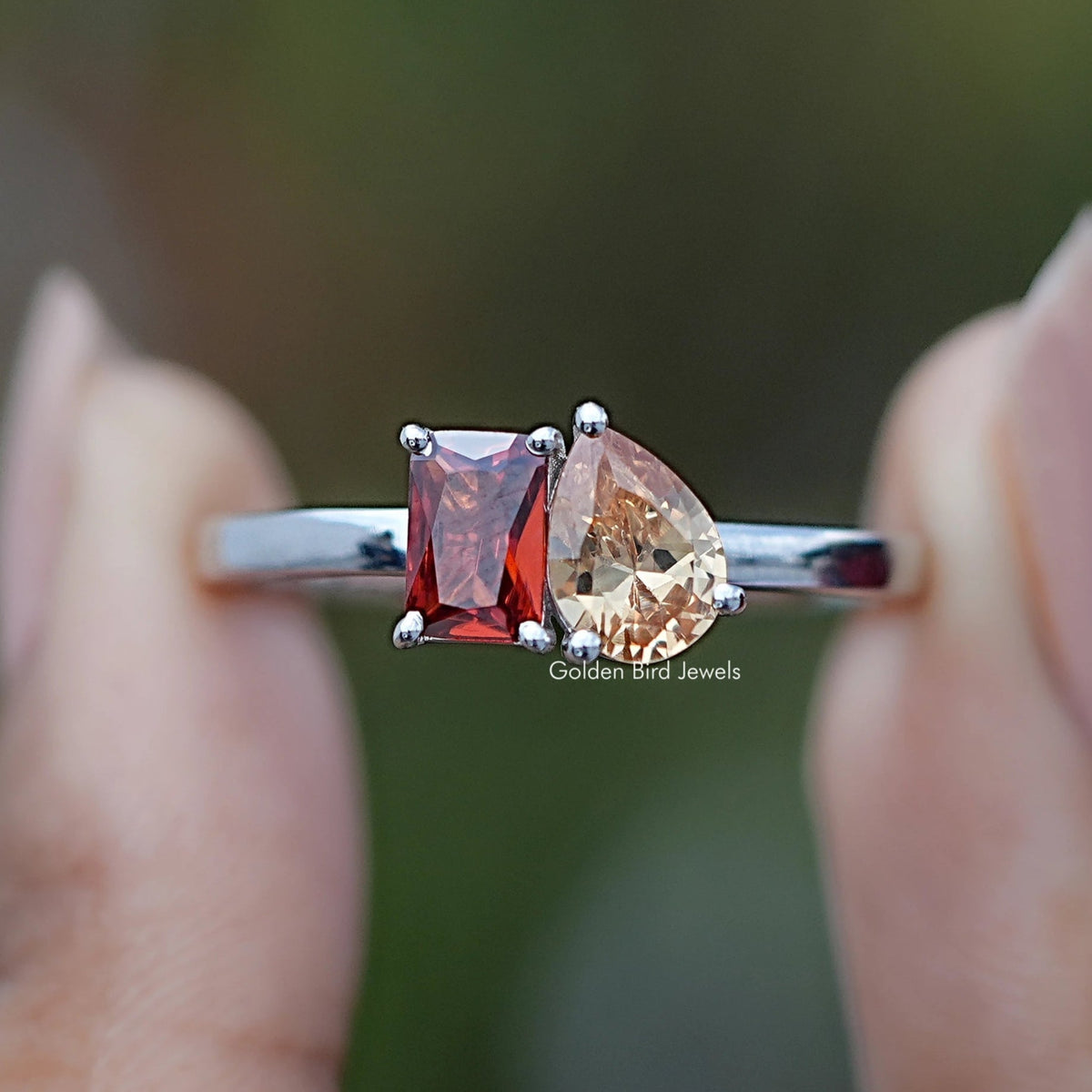 Front view of Radiant And Pear Gemstone Toi Et Moi Ring