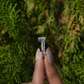 Side View A Radiant Cut Diamond Bridal Ring Set in a two fingers
