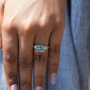 Radiant And Triangle Cut Moissanite Ring In finger