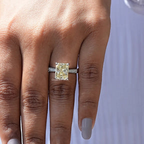 Detailed View Of Radiant And Round Cut Moissanite Ring In White Gold