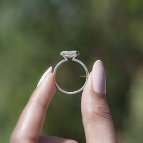 Back view of Radiant Cut Moissanite Solitaire Ring in secure setting 