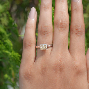 View of East West Yellow Radiant moissanite Solitaire Ring 
