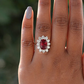 In finger front View of Cushion Cut Halo Ring In Yellow Gold
