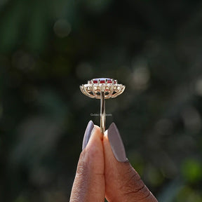 Side View of Cushion Cut And Round Cut Halo Ring In two fingers