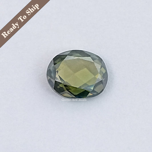 Oval rose-cut moissanite loose stone, faceted light greenish