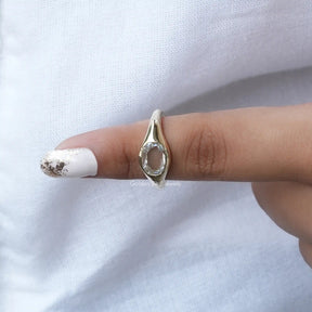 In finger front View of Bezel Set Oval Rose Cut Moissanite Ring