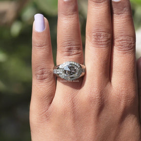 Close-Up View of Rose Cut Oval Halo Engagement Ring In White Gold