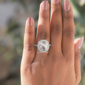 View of Oval Cut Moissanite Halo Engagement Ring In White Gold