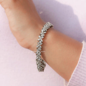 Detailed View of Round And Marquise Cut Diamond Bracelet In Women's Hand