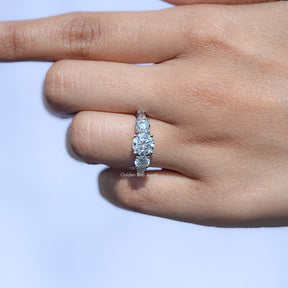 View of Round And Baguette Cut Diamond Five Stone Ring In White Gold