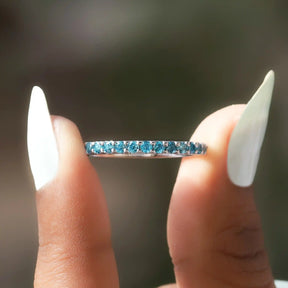 Front View of Round Cut Aquamarine Gemstone Eternity Band In two Fingers