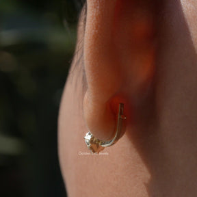 Back view of round cut cluster earrings