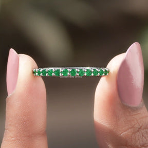 Detailed View of Round Emerald Cut Gemstone Half Eternity Band In White Gold