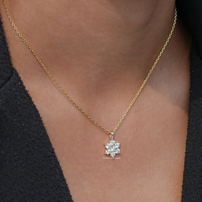 Close-Up View of Round Cut Lab Diamond Floral Pendant In Yellow Gold