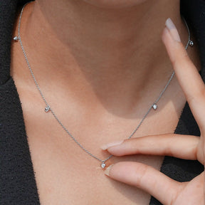 Detailed View Of Round Cut Diamond Station Necklace In White Gold