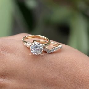 View of Round Cut Moissanite Ring In Yellow Gold 