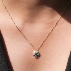 View of round cut moissanite cluster solitaire pendant 