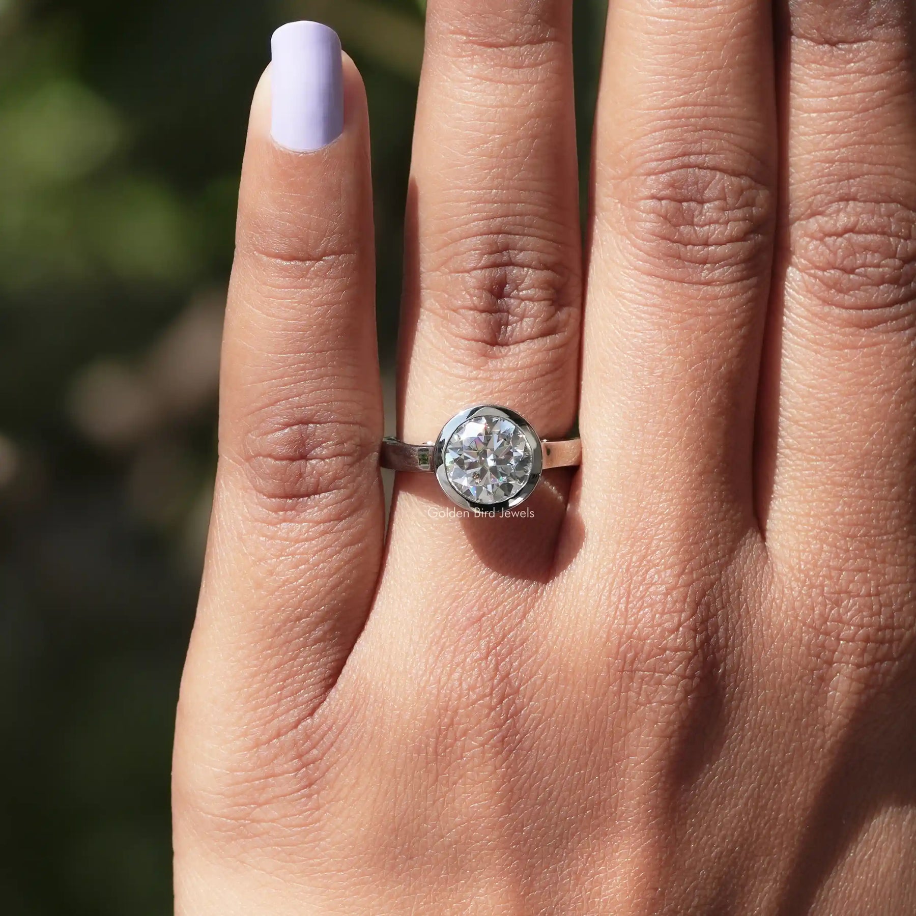 View of Round Cut Moissanite Engagement Ring In White Gold