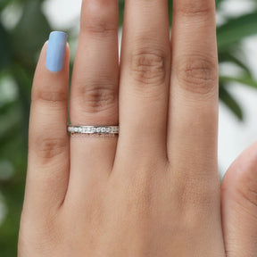 Detailed View Of Moissanite Round Cut Channel Set Wedding Band In White Gold
