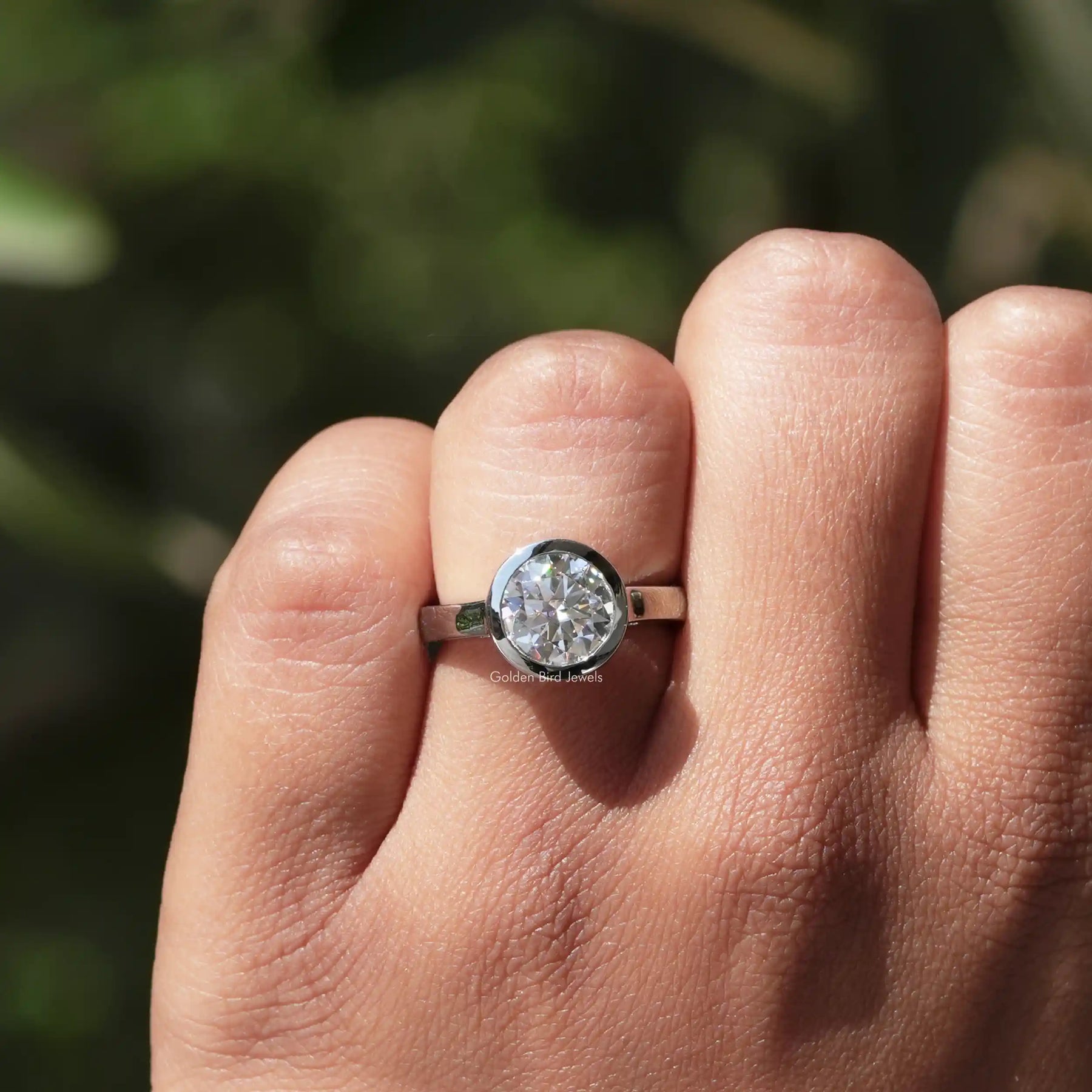View of Round Cut Moissanite Ring In Finger