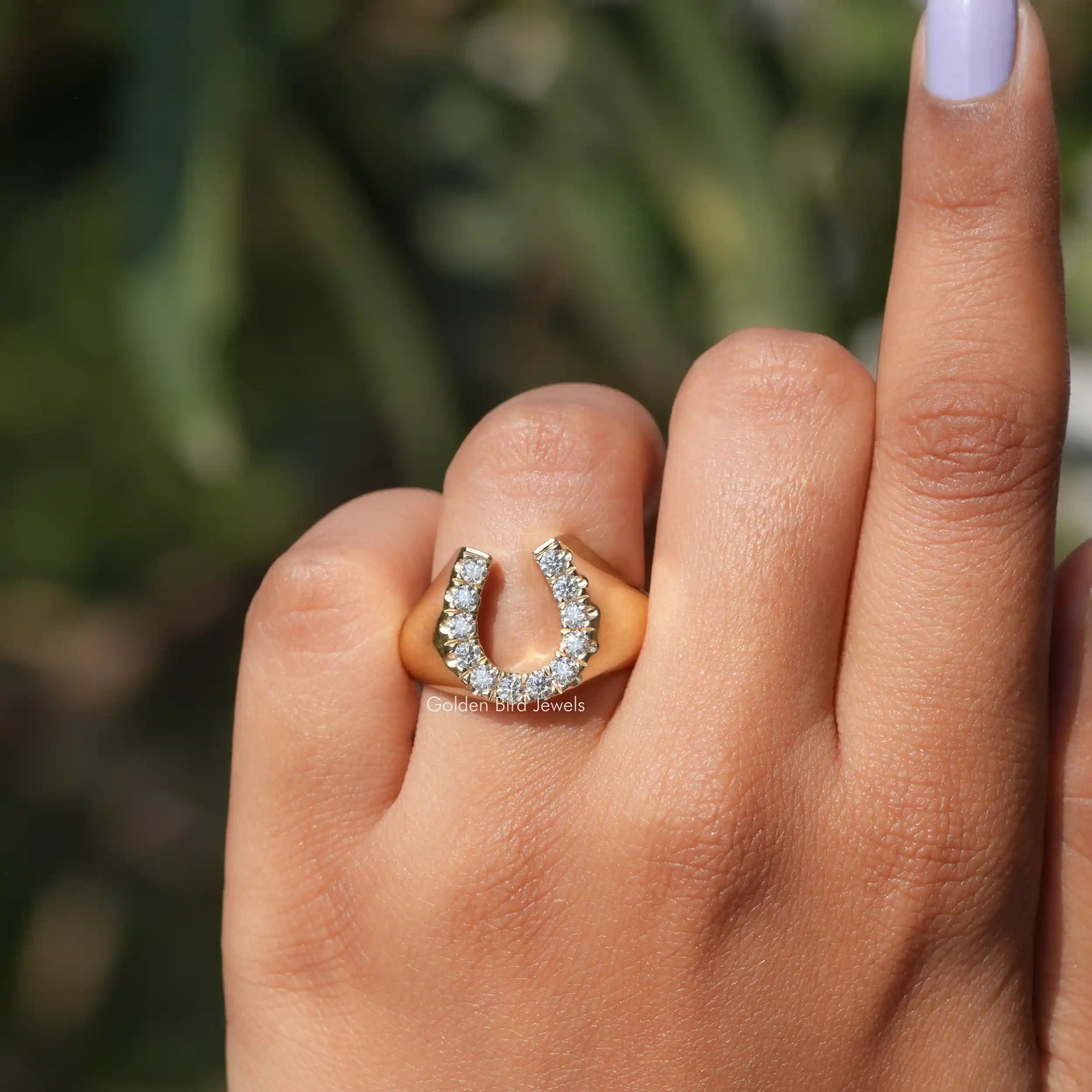 In front view of moissanite Horseshoe cut Ring
