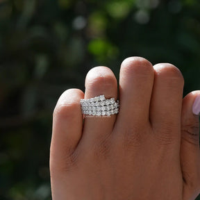 Close-Up View of Round Cut Moissanite Half Eternity Band In White Gold