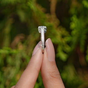 Side View of Old European Cut Moissanite Solitaire Vintage Ring In two fingers