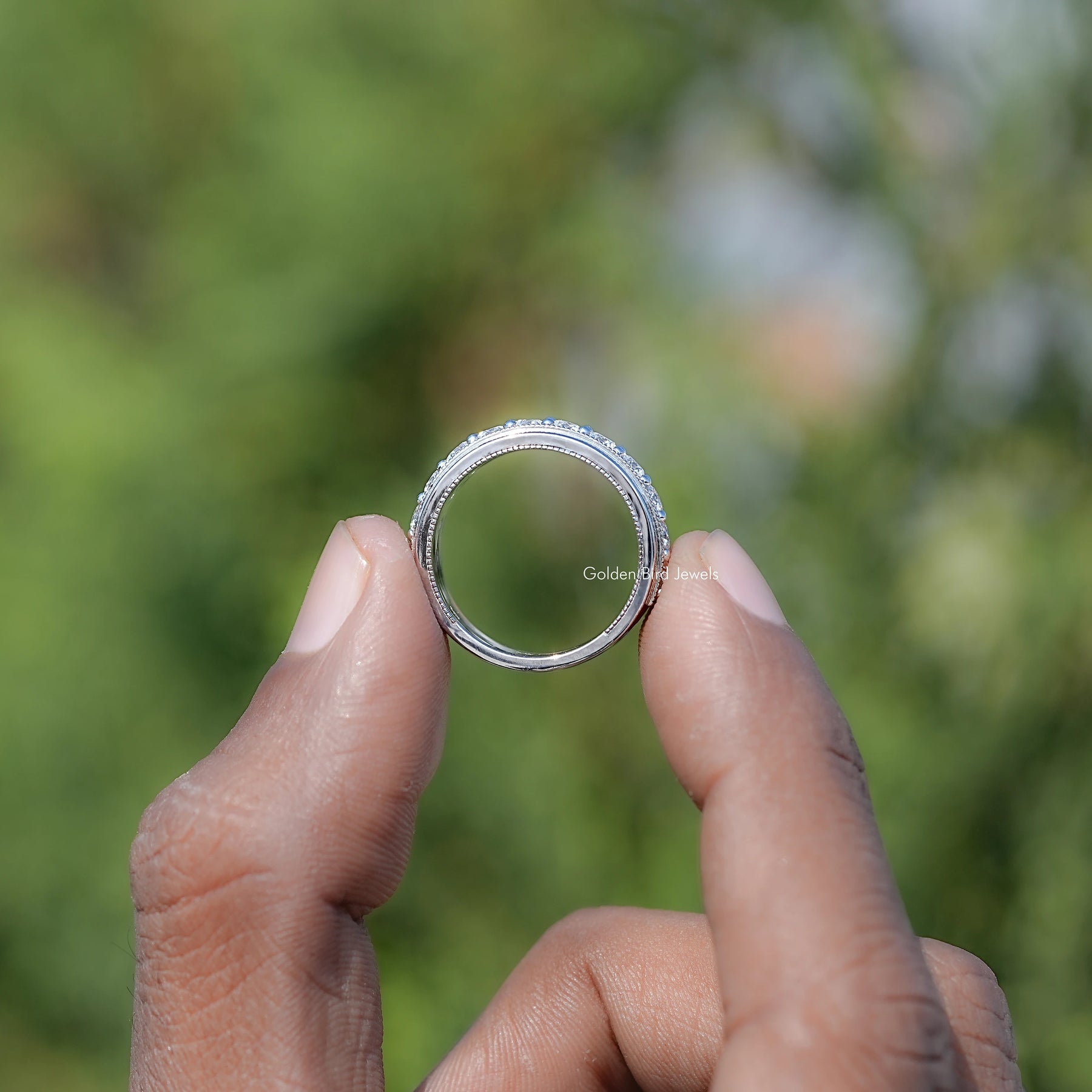 Back view of Round Shaped Solitaire Men's Band Set in secure setting