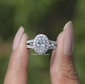 Front view of Diamond Split Shank Engagement Ring holding in two fingers 