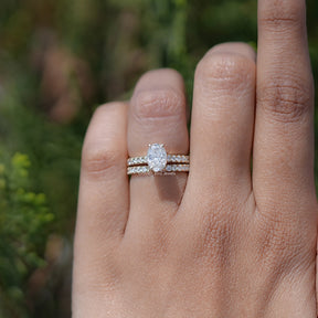 In finger front view of Oval Cut Moissanite engagement ring 
