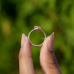 Back View of Kite Cut lab Diamond Engagement Ring In two fingers