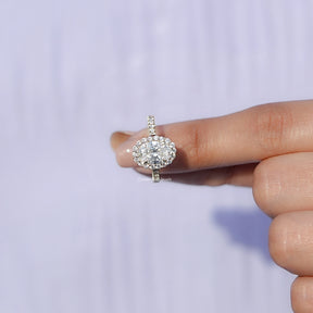 In finger front View of Oval Cut Lab Diamond Engagement Ring In Yellow Gold