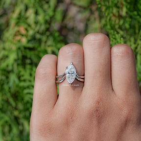 In finger front view of Marquise Cut Moissanite Solitaire Chevron Ring  