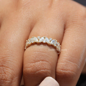 Side View of Engagement ring crafted With Marquise And Round Moissanite
