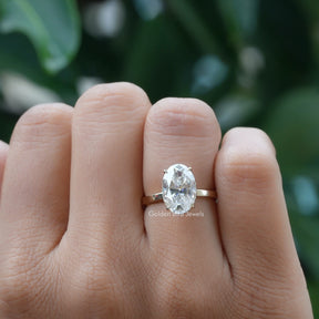View of Crushed Ice Oval Moissanite Hidden Halo Ring In Yellow Gold