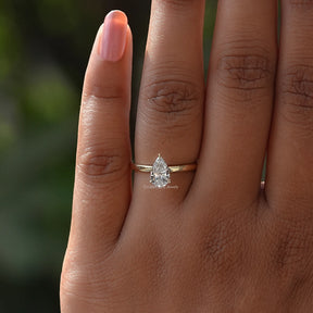 View of Pear Cut Diamond Shaped Solitaire Ring In Yellow Gold