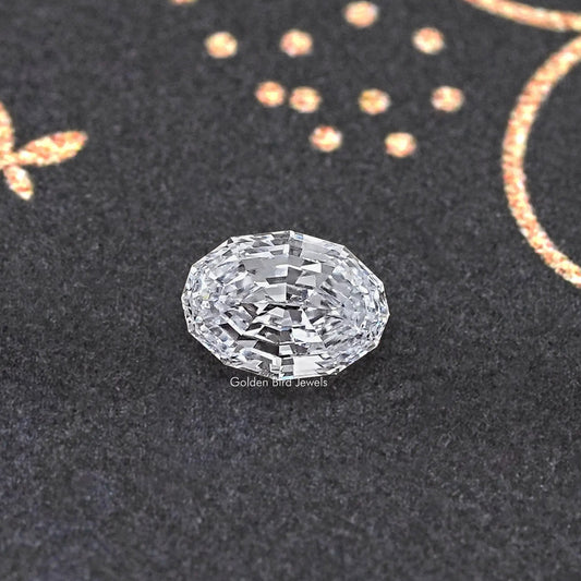 Loose lab-grown oval diamond with step-cut facets, light clear sparkle