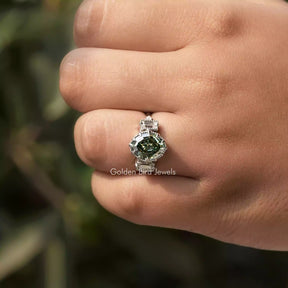 Close-Up View of Oval And Baguette Cut Moissanite Engagement Ring In White Gold        