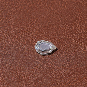 Side VIew Of Colorless Step Cut Pear Loose Moissanite 