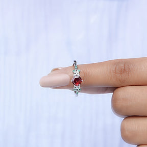 In finger front View of Hexagon Cut Gemstone Accent Ring In White Gold