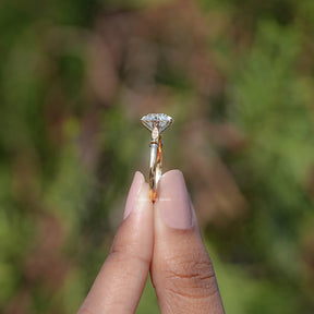 Side View of Engagement ring crafted With Old European Round Moissanite 
