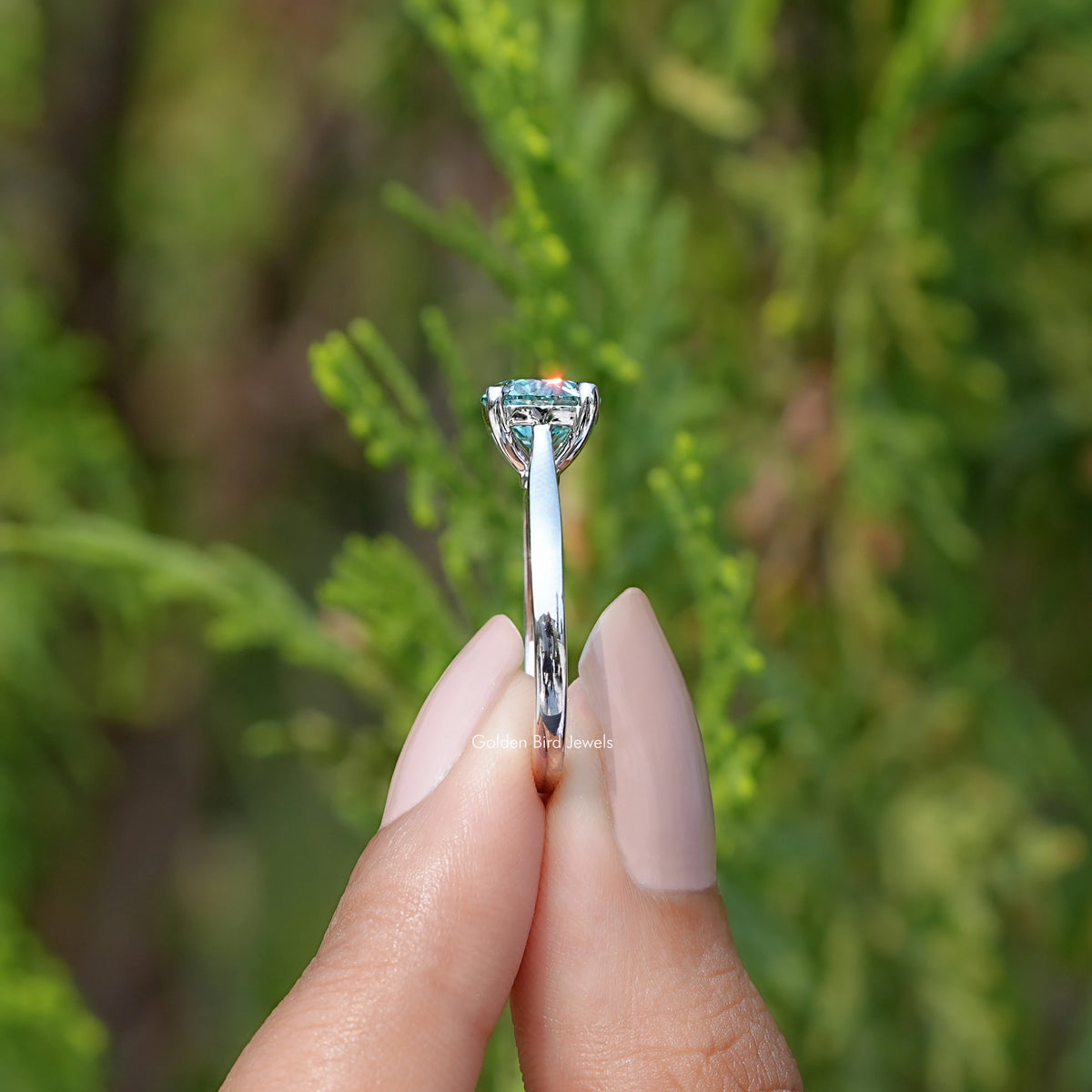 Side View of  Blue Green Round moissanite Solitaire Ring
